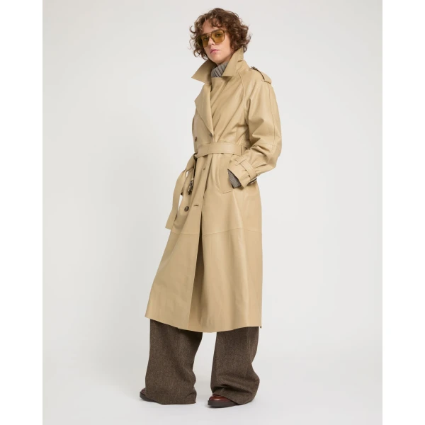 Woman wearing Yves Salomon shearling fur coat – luxury outerwear at Coveti
