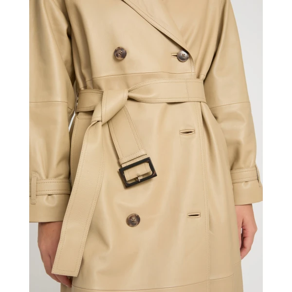 Woman wearing Yves Salomon shearling fur coat – luxury outerwear at Coveti