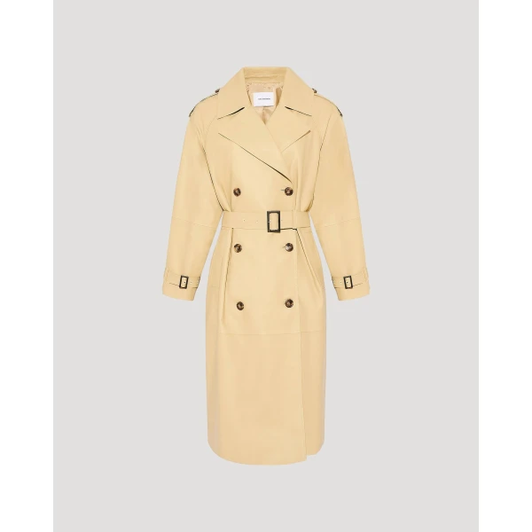 Woman wearing Yves Salomon shearling fur coat – luxury outerwear at Coveti
