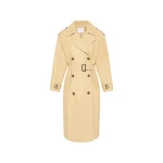 Woman wearing Yves Salomon shearling fur coat – luxury outerwear at Coveti