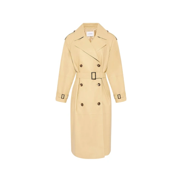 Woman wearing Yves Salomon shearling fur coat – luxury outerwear at Coveti