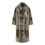 Woman wearing Yves Salomon shearling fur coat – luxury outerwear at Coveti