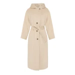 Woman wearing Yves Salomon shearling fur coat – luxury outerwear at Coveti