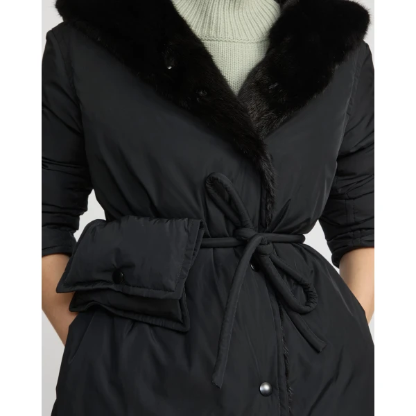 Woman wearing Yves Salomon shearling fur coat – luxury outerwear at Coveti