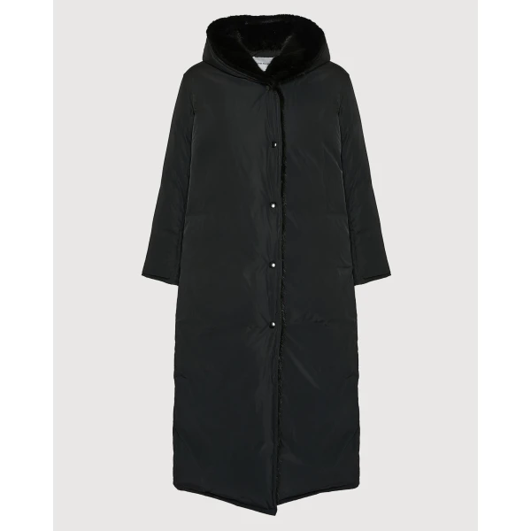 Woman wearing Yves Salomon shearling fur coat – luxury outerwear at Coveti