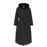 Woman wearing Yves Salomon shearling fur coat – luxury outerwear at Coveti