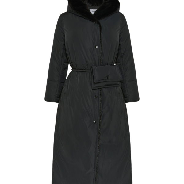 Woman wearing Yves Salomon shearling fur coat – luxury outerwear at Coveti