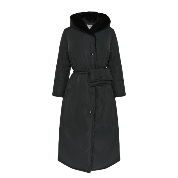 Woman wearing Yves Salomon shearling fur coat – luxury outerwear at Coveti