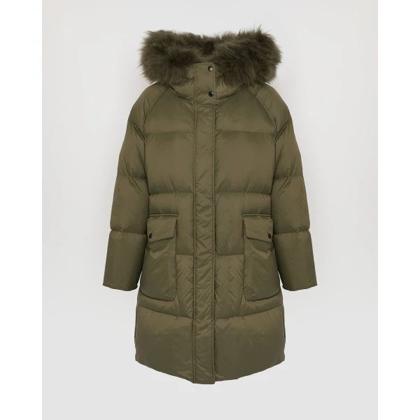 Woman wearing Yves Salomon shearling fur coat – luxury outerwear at Coveti