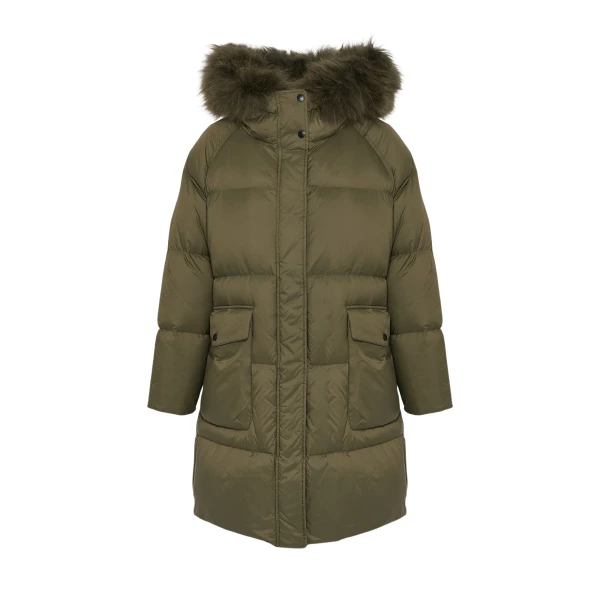 Woman wearing Yves Salomon shearling fur coat – luxury outerwear at Coveti