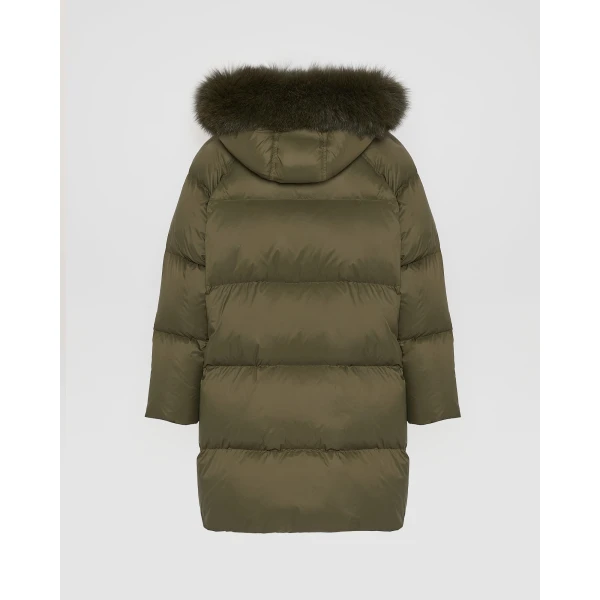 Woman wearing Yves Salomon shearling fur coat – luxury outerwear at Coveti