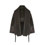 Woman wearing Yves Salomon shearling fur coat – luxury outerwear at Coveti