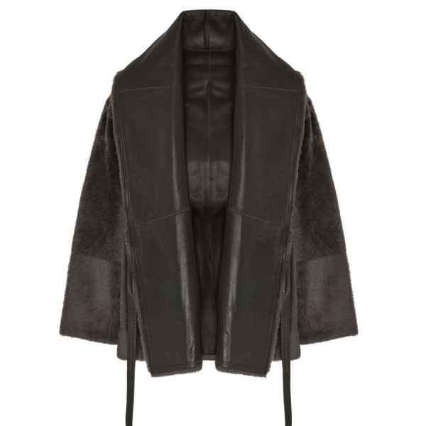 Woman wearing Yves Salomon shearling fur coat – luxury outerwear at Coveti