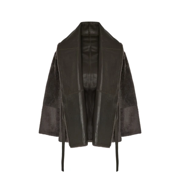Woman wearing Yves Salomon shearling fur coat – luxury outerwear at Coveti
