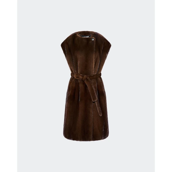 Woman wearing Yves Salomon shearling fur coat – luxury outerwear at Coveti