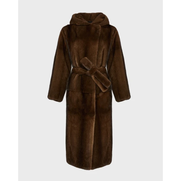 Woman wearing Yves Salomon shearling fur coat – luxury outerwear at Coveti
