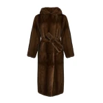 Woman wearing Yves Salomon shearling fur coat – luxury outerwear at Coveti