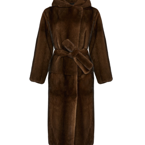 Woman wearing Yves Salomon shearling fur coat – luxury outerwear at Coveti