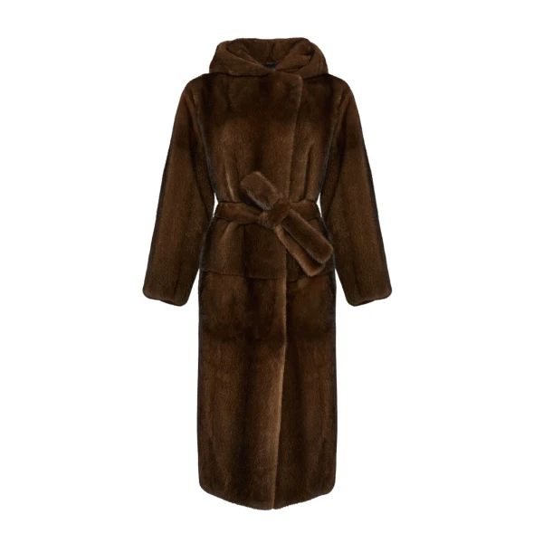 Woman wearing Yves Salomon shearling fur coat – luxury outerwear at Coveti
