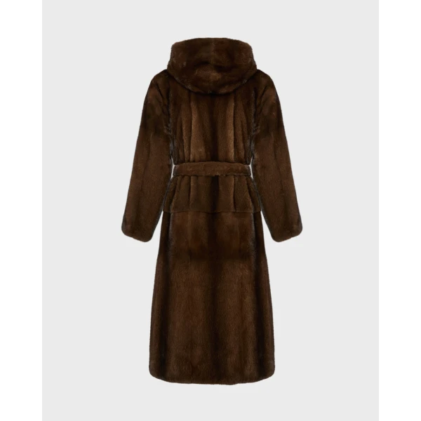 Woman wearing Yves Salomon shearling fur coat – luxury outerwear at Coveti