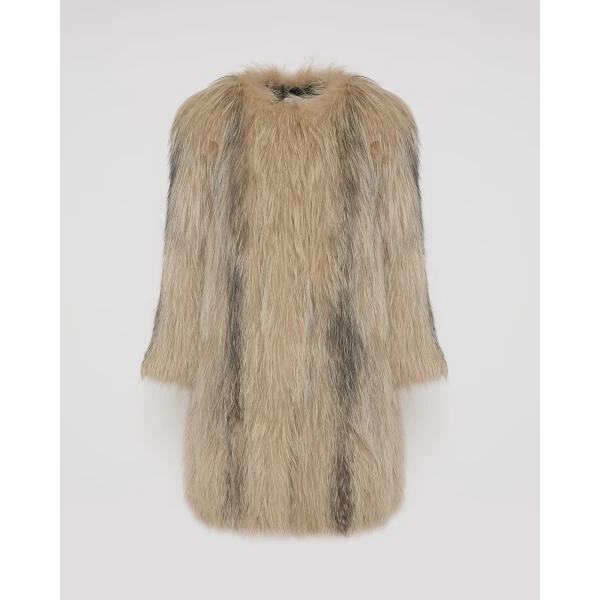 Woman wearing Yves Salomon shearling fur coat – luxury outerwear at Coveti