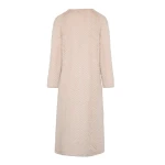 Woman wearing Yves Salomon shearling fur coat – luxury outerwear at Coveti