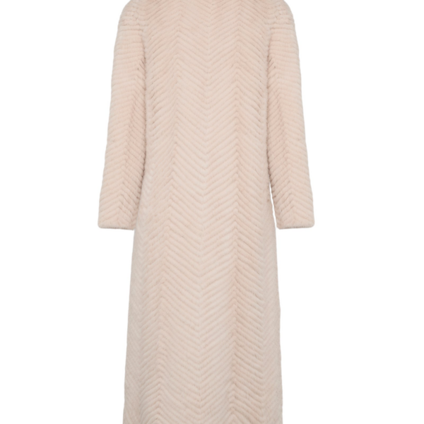 Woman wearing Yves Salomon shearling fur coat – luxury outerwear at Coveti