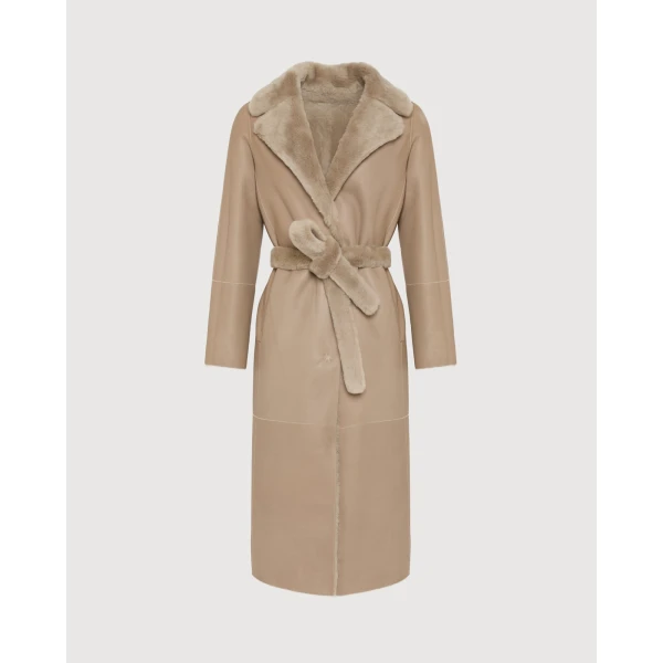 Woman wearing Yves Salomon shearling fur coat – luxury outerwear at Coveti
