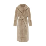 Woman wearing Yves Salomon shearling fur coat – luxury outerwear at Coveti