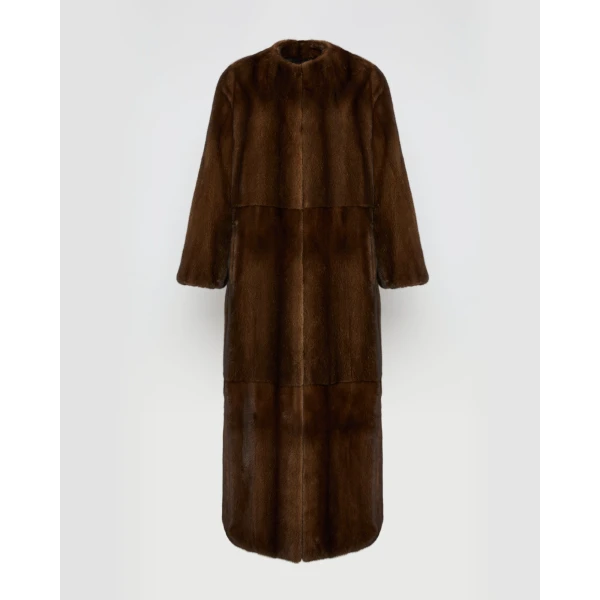 Woman wearing Yves Salomon shearling fur coat – luxury outerwear at Coveti