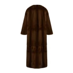 Woman wearing Yves Salomon shearling fur coat – luxury outerwear at Coveti