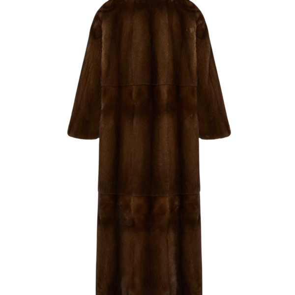 Woman wearing Yves Salomon shearling fur coat – luxury outerwear at Coveti