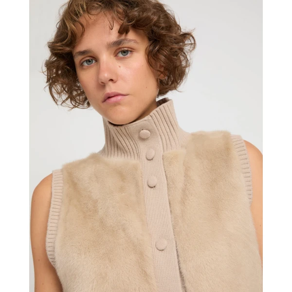 Woman wearing Yves Salomon shearling fur coat – luxury outerwear at Coveti