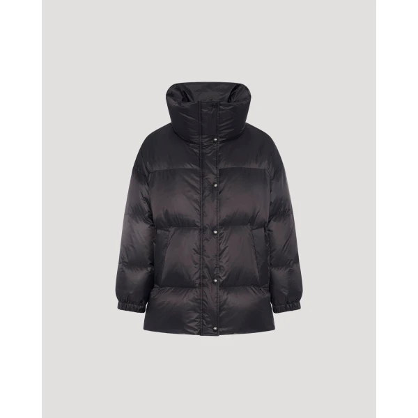 Woman wearing Yves Salomon shearling fur coat – luxury outerwear at Coveti