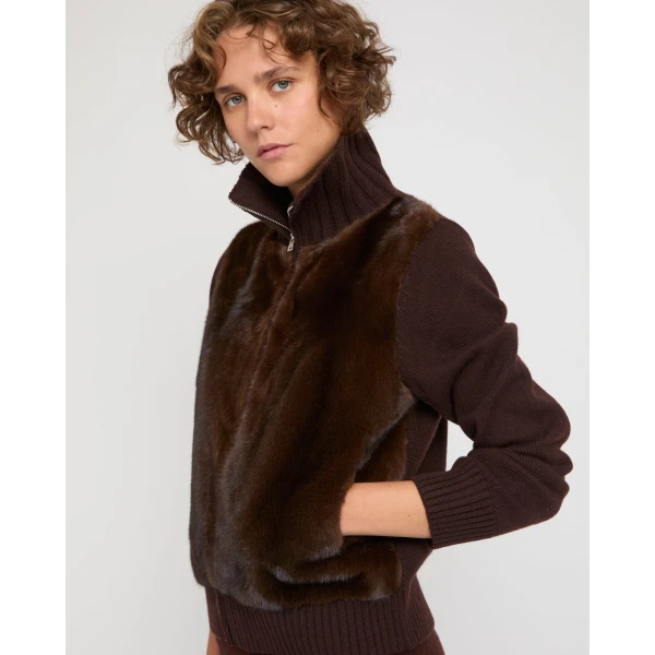 Woman wearing Yves Salomon shearling fur coat – luxury outerwear at Coveti