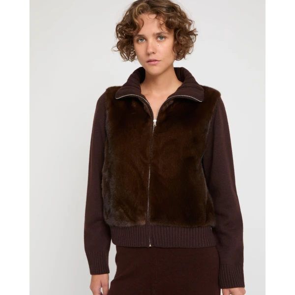 Woman wearing Yves Salomon shearling fur coat – luxury outerwear at Coveti