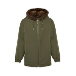 Woman wearing Yves Salomon shearling fur coat – luxury outerwear at Coveti