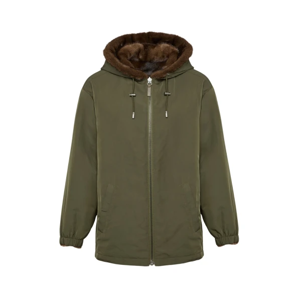 Woman wearing Yves Salomon shearling fur coat – luxury outerwear at Coveti