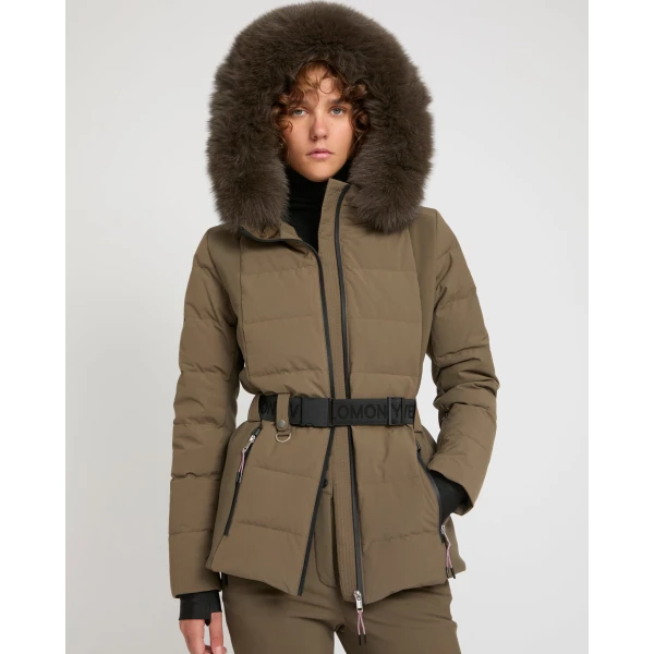 Woman wearing Yves Salomon shearling fur coat – luxury outerwear at Coveti