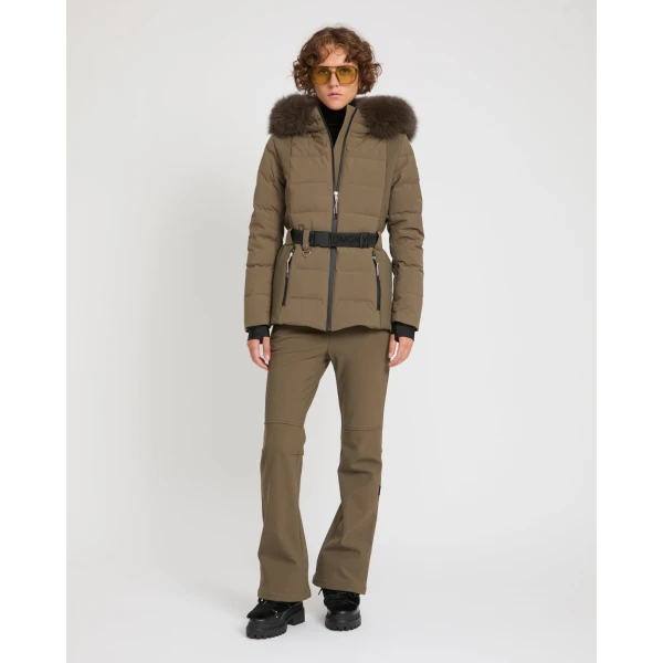 Woman wearing Yves Salomon shearling fur coat – luxury outerwear at Coveti