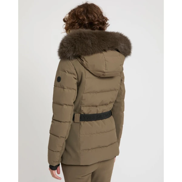 Woman wearing Yves Salomon shearling fur coat – luxury outerwear at Coveti