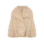 Woman wearing Yves Salomon shearling fur coat – luxury outerwear at Coveti