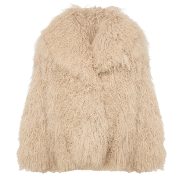 Woman wearing Yves Salomon shearling fur coat – luxury outerwear at Coveti