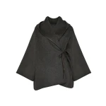 Woman wearing Yves Salomon shearling fur coat – luxury outerwear at Coveti