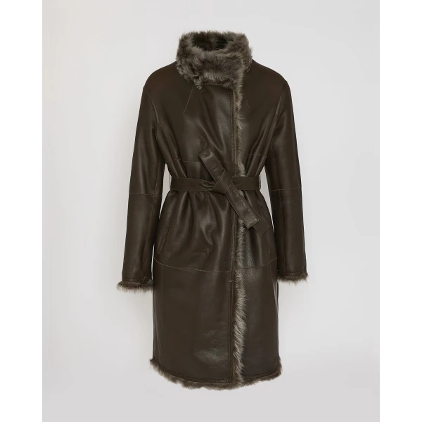 Woman wearing Yves Salomon shearling fur coat – luxury outerwear at Coveti