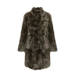 Woman wearing Yves Salomon shearling fur coat – luxury outerwear at Coveti