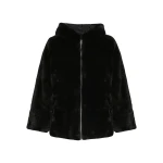 Woman wearing Yves Salomon shearling fur coat – luxury outerwear at Coveti