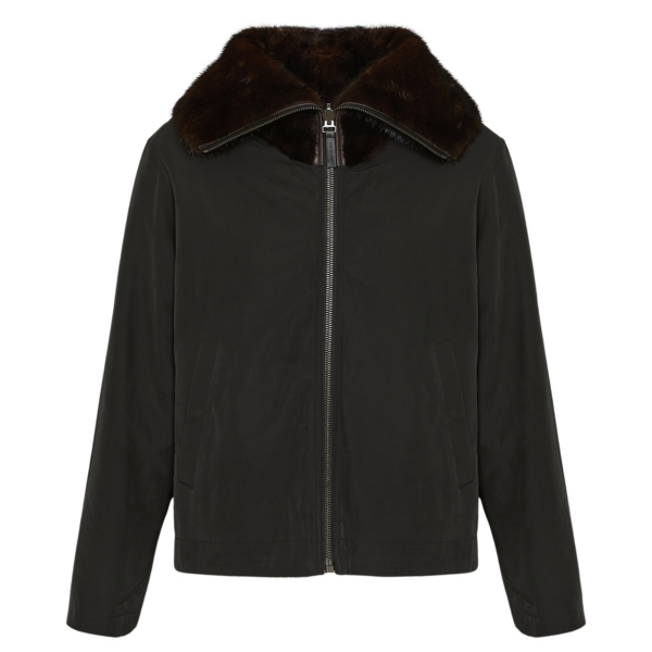 Woman wearing Yves Salomon shearling fur coat – luxury outerwear at Coveti