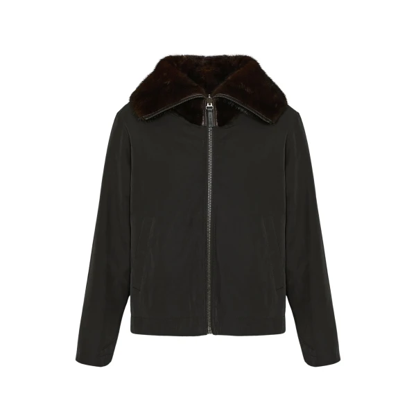 Woman wearing Yves Salomon shearling fur coat – luxury outerwear at Coveti