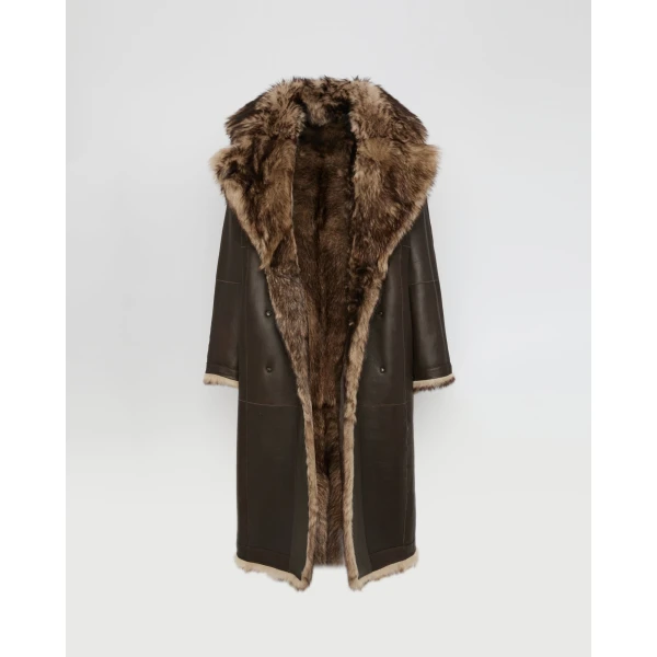 Woman wearing Yves Salomon shearling fur coat – luxury outerwear at Coveti